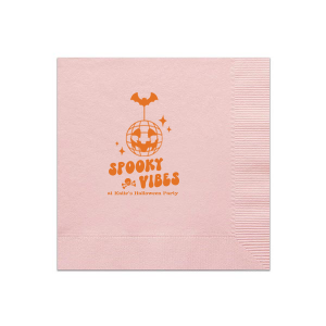 Embrace those spooky vibes with our Spooky Vibes Napkin! This custom Halloween party decor will elevate any event. Featuring a graphic of a pumpkin disco ball, bat, a skull, and sparkles, this napkin is ready to party.