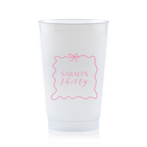 Sip in style at your birthday bash with the Ribbon Frame Birthday Bash Cup, elegantly framed like a ribbon and bow, featuring your name and new age in a whimsical script. A festive and personalized touch to celebrate another fabulous year.