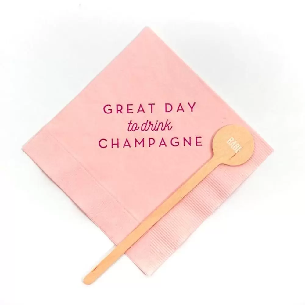 personalized cocktail napkins and stir sticks for a creative housewarming gift