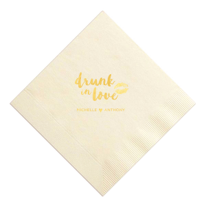 Set hearts aflutter with the Drunk in Love Smooch Napkin, where a whimsical 'drunk in love' meets a playful lipstick kiss. Below, the couple's names unite with a heart, capturing the heady bliss of romance at your celebration.