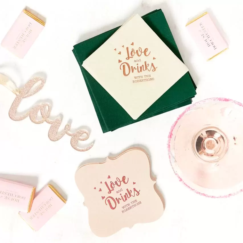 Personalized coasters and custom cocktail napkins as galentine's day decor