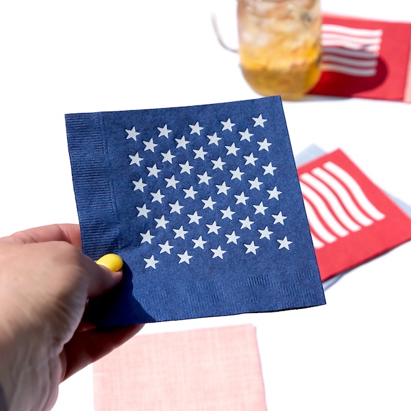 Close up of blue napkins with white stars