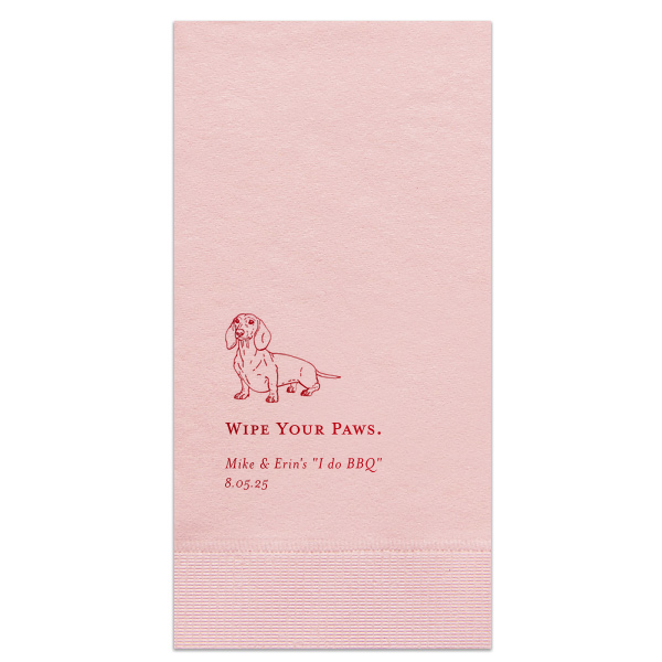 The Dachshund Wipe Your Paws Wedding Napkin delightfully blends humor and pet affection. It showcases a cheerful dachshund illustration above the witty phrase "WIPE YOUR PAWS," playfully connecting napkin utility with the couple's fondness for their dog. Beneath this fun phrase are the couple's names and event date, adding a personalized element.