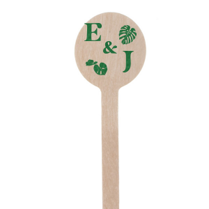 The Tropical True Love Initials Stir Stick brings the lush vibrancy of the tropics to your celebration, featuring your initials encircled by an array of exotic leaf graphics. The initials themselves are inscribed in a relaxed and breezy script that captures the laid-back essence of a sun-kissed getaway. This personalized stirrer is a fresh addition to any event, inviting guests to sip and savor the spirit of paradise.