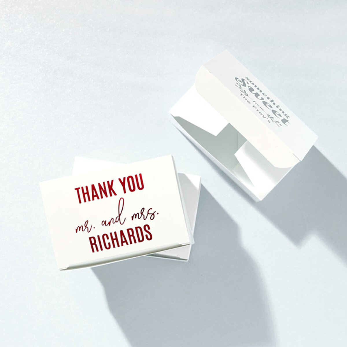 white disposable Cake boxes with red foil stamped thank you design