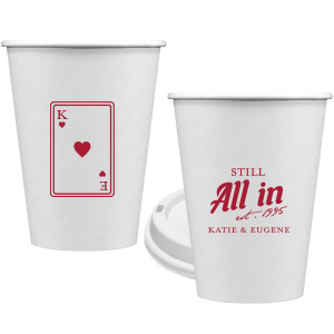 Celebrate lasting love with the Playing Card Still All In Anniversary Cup. One side adorns a hearts playing card graphic, personalized with your initials. The other side is inscribed with "Still All In," alongside the celebratory year and the couple's names, symbolizing a winning hand in marriage.