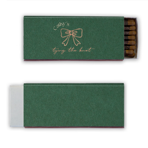 Spark excitement for the upcoming nuptials with the Bow Tying the Knot Bridal Matchbook, personalized with the bride's name elegantly arched over a stylized bow graphic. The phrase "Tying the Knot" in a delicate script font completes the design, making for a memorable and functional keepsake from the bridal shower.