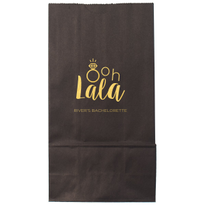 Delight guests with the Ooh Lala Bachelorette Bag, where a glimmering solitaire ring cleverly becomes the 'O' in 'Ooh.' 'Lala' whimsically precedes the bride-to-be's name, making this bag a charming memento of celebration and friendship.