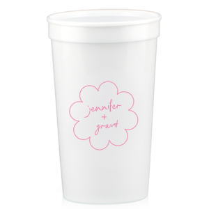 Sip in style at your whimsical wedding with the Kitschy Cocktail Hour Floral Frame Cup. Personalize this charming vessel with the couple's names, elegantly scripted within a blooming flower-shaped frame. A modern and enchanting choice for your celebratory toasts.