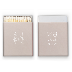 Light up your autumnal love story with the Boho Terracotta Line Art Wedding Matchbox. Customize one side with the couple's names elegantly scripted, symbolizing unity. The other side is adorned with a minimalist line drawing of two clinking wine glasses, topped by the wedding date in a refined serif font, ready to commemorate your chic, moody celebration.