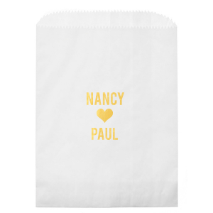 Celebrate a union with the Heart-Linked Names Gift Bag, a charming token for guests. This design boldly features a couple's names in all caps, intimately linked by a solid heart, symbolizing their love. The straightforward yet profound design is a perfect memento for guests to remember the special day by. Simple, elegant, and full of meaning, this bag is ideal for distributing wedding favors or treats.