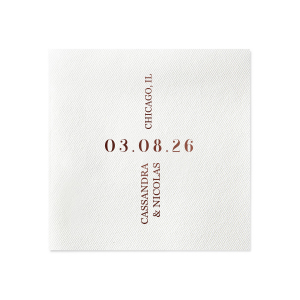 Celebrate your union with the Central Date Flair Napkin, where the wedding date takes center stage, boldly inscribed between the ascending couple's names and location details. A striking layout for an unforgettable matrimonial event.