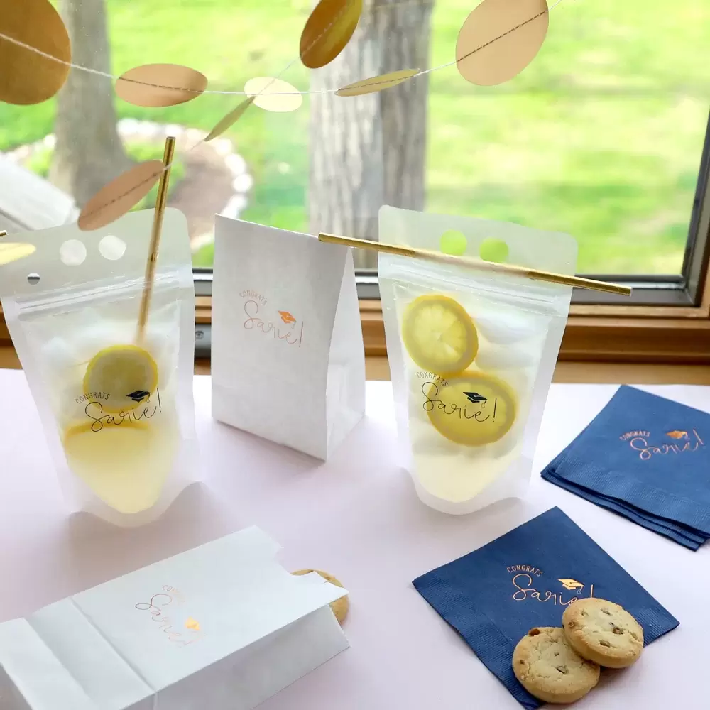 graduation drink pouches and personalized graduation cocktail napkin