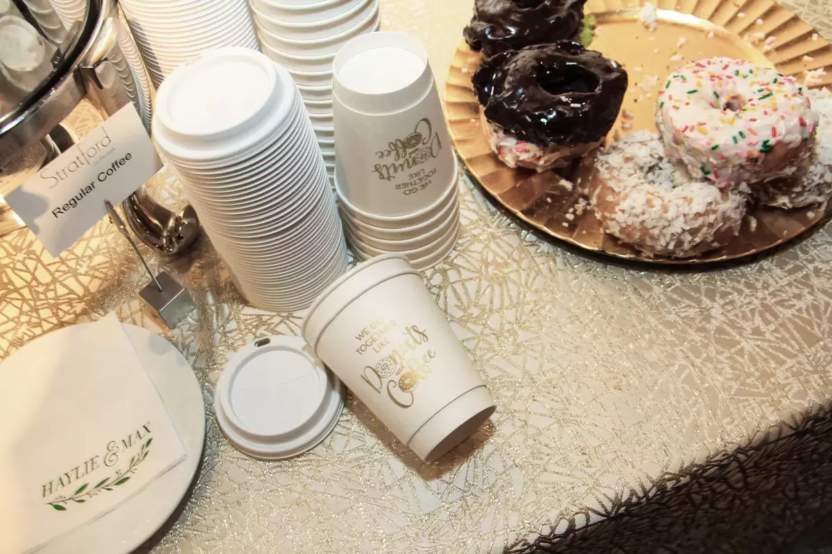 personalized coffee cups for donut wall at geometric gold and green wedding
