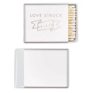Ignite romance with the Love Struck Banner Matchbox featuring the smitten phrase above a banner cradling your special date. This design charmingly captures the couple's love, making each strike a celebration of their union.