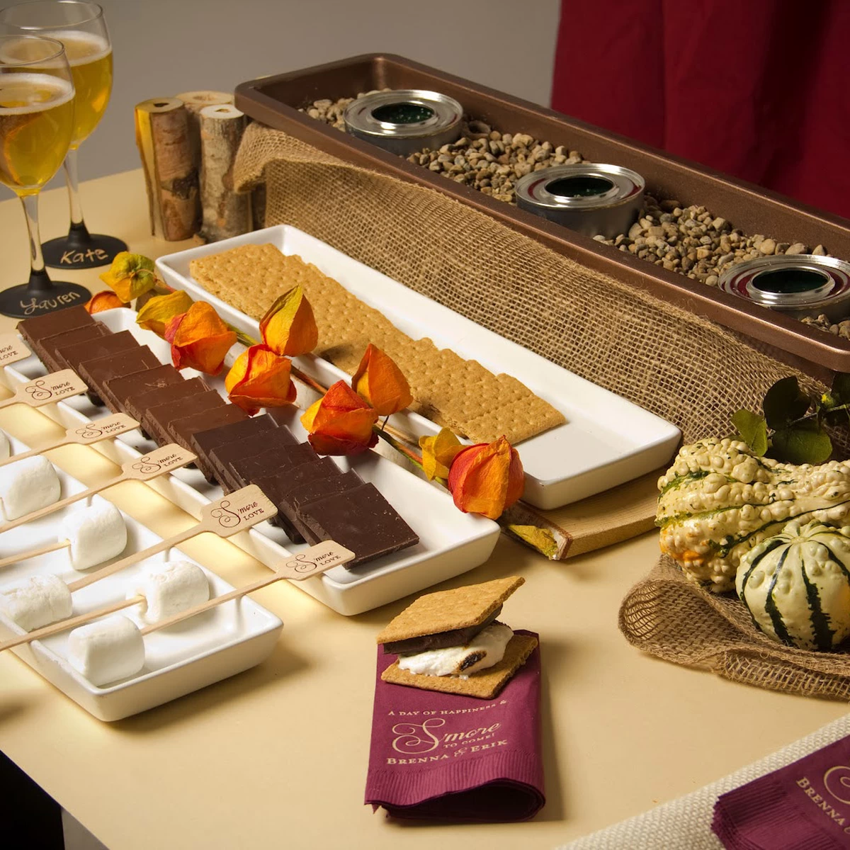 DIY S'more bar with personalized napkins and personalized food skewers