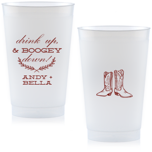 Kick up your heels with the Boogey Down Cowboy Cup emblazoned with 'Drink Up & Boogey Down!' and a foliage flourish. Personalized with your names and adorned with cowboy boots, it's perfect for a lively, Western-themed celebration.