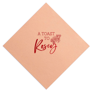 Celebrate in style with the Floral Toast Napkin. Adorned with “A TOAST TO” in bold block letters, it’s elegantly framed by an intricate peony design, symbolizing love and joy. Personalize with the celebrant’s name in beautiful script, making this napkin a meaningful addition to any special occasion.