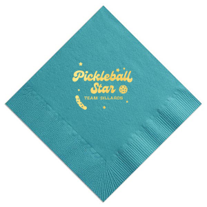 Serve up style with the Pickleball Star Champion Napkin, showcasing a vibrant 'Pickleball Star' motif with a playful pickleball and pickle graphic. Personalize with your team or family name to ace your event décor. Ideal for pickleball tournaments and team celebrations.