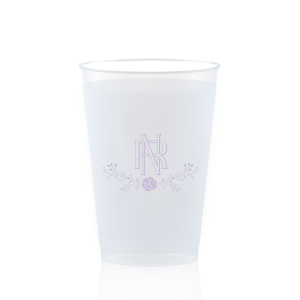 Sip in the essence of unity with the Entwined Initials Floral Cup, where artfully intertwined initials symbolize a confluence of two lives. A graceful floral flourish, crowned by a single rose, adds a touch of botanical elegance to this exquisite celebration of partnership.