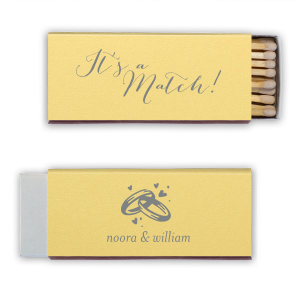 Ignite serendipity with the It’s a Match Matchbox, flaunting love's fate in graceful script. Twinkling bands and hearts on the back, plus the couple's names, celebrate a match made in bliss.