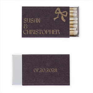 Ignite a lifetime of memories with the Modern Names and Date Bow Matchbox, personalized with the couple's names and the date of your event, complemented by a hand-drawn bow graphic. A charming keepsake for weddings, engagement parties, or anniversaries.