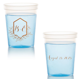 Sip with pride from the Family Crest Initials Cup, where a modern emblem blooms with hand-drawn foliage, reminiscent of ivy-clad ancestry. The couple's script initials rest within, and the event date on the reverse, crafting a legacy in each toast.