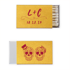 Celebrate eternal love with the Skull Couple Wedding Matchbox. Adorned with delightful sugar skulls, these matchboxes honor Dia de los Muertos—celebrating life and love. The back features the newlywed's initials and the event date, making it a unique token of vibrant tradition and joy.