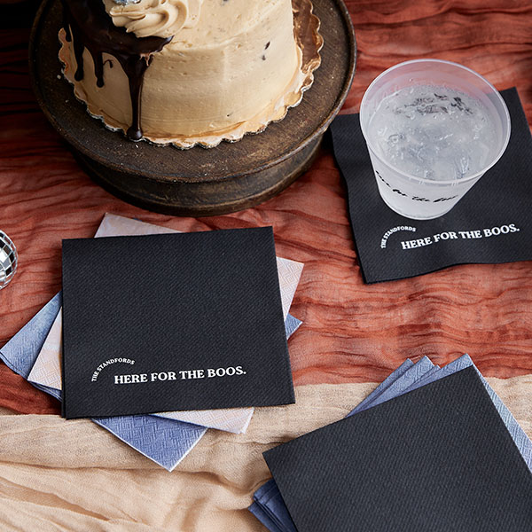 black napkin with the text "here for the boos"