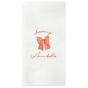Celebrate the bride-to-be with the Showering Love Bow Napkin, delicately personalized with her name in a romantic script, alongside the word "showering" and a stylish bow graphic. An elegant choice for a chic and trendy bridal shower.