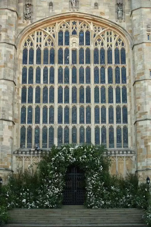 dramatic floral arches at royal wedding western doors