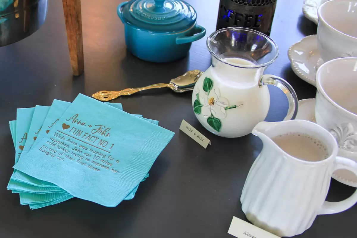 bridal shower coffee bar with personalized fun fact napkins