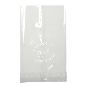 The Bespoke Logo Initials Stamp Wedding Bag design charmingly transforms the couple's initials into a bespoke logo, playfully echoing the sophistication of a stamped seal. Arching the city and date around it adds a personalized flair, turning each piece into a unique hallmark of their special day.