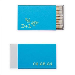Spark warmth with the Leaf Accent Wedding Match, featuring whimsical hand-drawn leaves for a whimsical botanical touch. Simple initials and the special date adorn this charming matchbox, perfect for sweetening the ambiance of your enchanting wedding day.