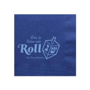 The This is How We Roll Napkin is a modern and fun custom decoration for your Hanukkah party! Personalize this dreidel adorned napkin with your family name.
