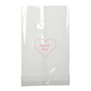 Our beautiful custom Ivory Party Bag with Matte Ballet Pink Foil has a Thank You Heart graphic designed by Martha Stewart Weddings. Send guests home with a sweet treat in style!