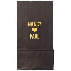 Celebrate a union with the Heart-Linked Names Gift Bag, a charming token for guests. This design boldly features a couple's names in all caps, intimately linked by a solid heart, symbolizing their love. The straightforward yet profound design is a perfect memento for guests to remember the special day by. Simple, elegant, and full of meaning, this bag is ideal for distributing wedding favors or treats.