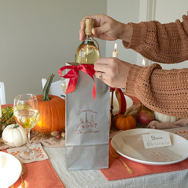 wine pulled out of gift bag