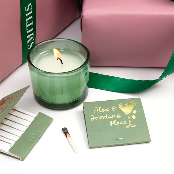 Green and Gold cat matches on a pink background