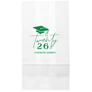 Honor the graduate's milestone with the Grad Script Cap Celebration Bag, elegantly personalized with the graduate's name and graduation year in flowing script, complemented by a classic graduation cap graphic. A chic and functional memento for any graduation festivity.
