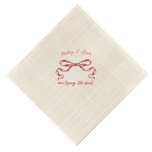 Announce your union with the Nuptial Knot Bow Napkin, featuring a romantic bow graphic and the sweet declaration 'are tying the knot.' Personalize with both your names to add a loving touch to your engagement party or wedding reception.
