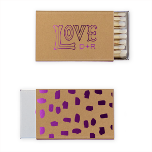 Feel the love with the LOVE Initials Matchbook. Featuring a funky and artistic "LOVE" graphic, this design radiates a groovy vibe. The couple’s initials below add a personal touch, making it perfect for celebrating big love in style.