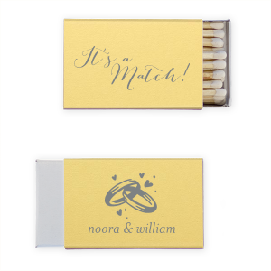 Ignite serendipity with the It’s a Match Matchbox, flaunting love's fate in graceful script. Twinkling bands and hearts on the back, plus the couple's names, celebrate a match made in bliss.