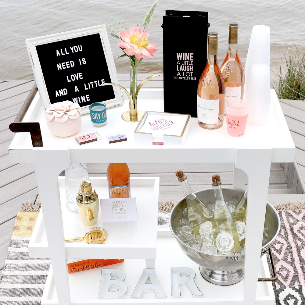 stocked bar cart complete with message board