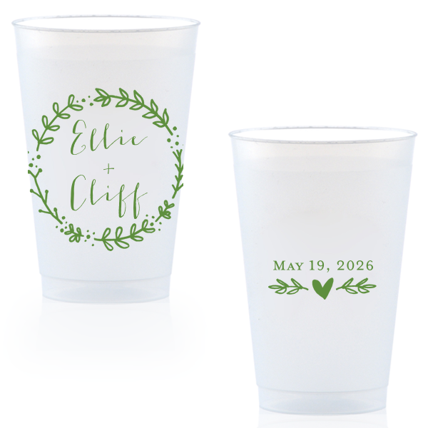 Raise a glass with the Wreath Names Cup where a playful leafy wreath lovingly encases your names. On the back, a branch with a centered heart underscores the date, infusing whimsy into every sip at your celebration.
