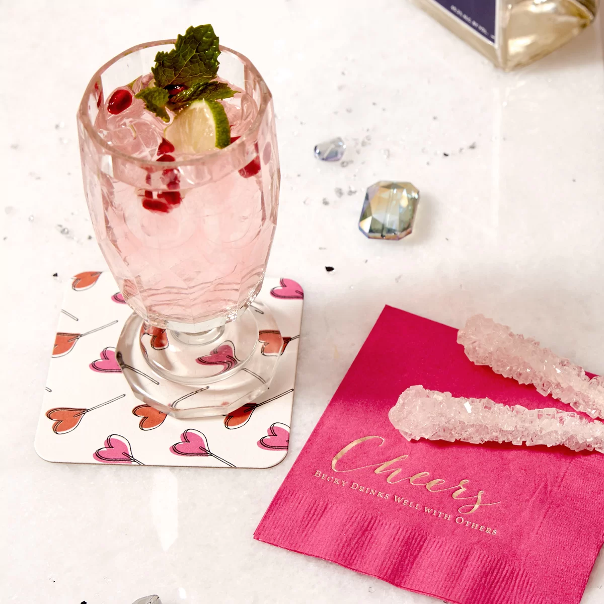 gin cocktail with personalized cocktail napkin