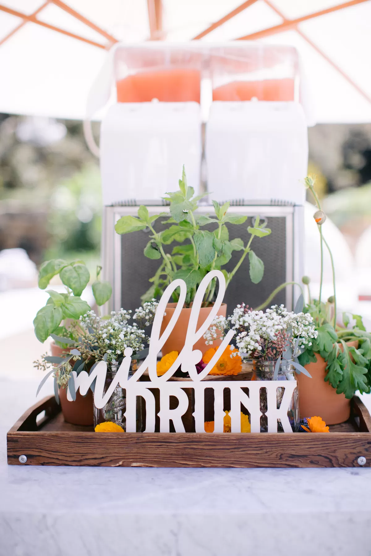 "milk drunk" décor at baby shower bar