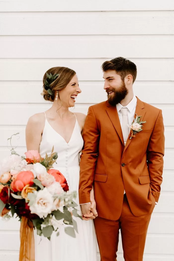 fall wedding trend 2019: moody colored suits and tuxedos