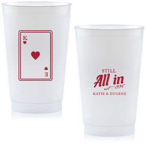 Celebrate lasting love with the Playing Card Still All In Anniversary Cup. One side adorns a hearts playing card graphic, personalized with your initials. The other side is inscribed with "Still All In," alongside the celebratory year and the couple's names, symbolizing a winning hand in marriage.