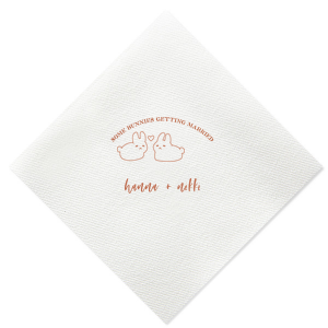 Hop into matrimonial joy with the Some Bunnies Wedding Napkin, complete with an adorable drawing of two bunnies and a heart nestled between them. The playful phrase "Some Bunnies Getting Married" sets a whimsical tone, while the area below awaits the couple's names, scripted with modern elegance. A delightful addition to your wedding tablescapes.
